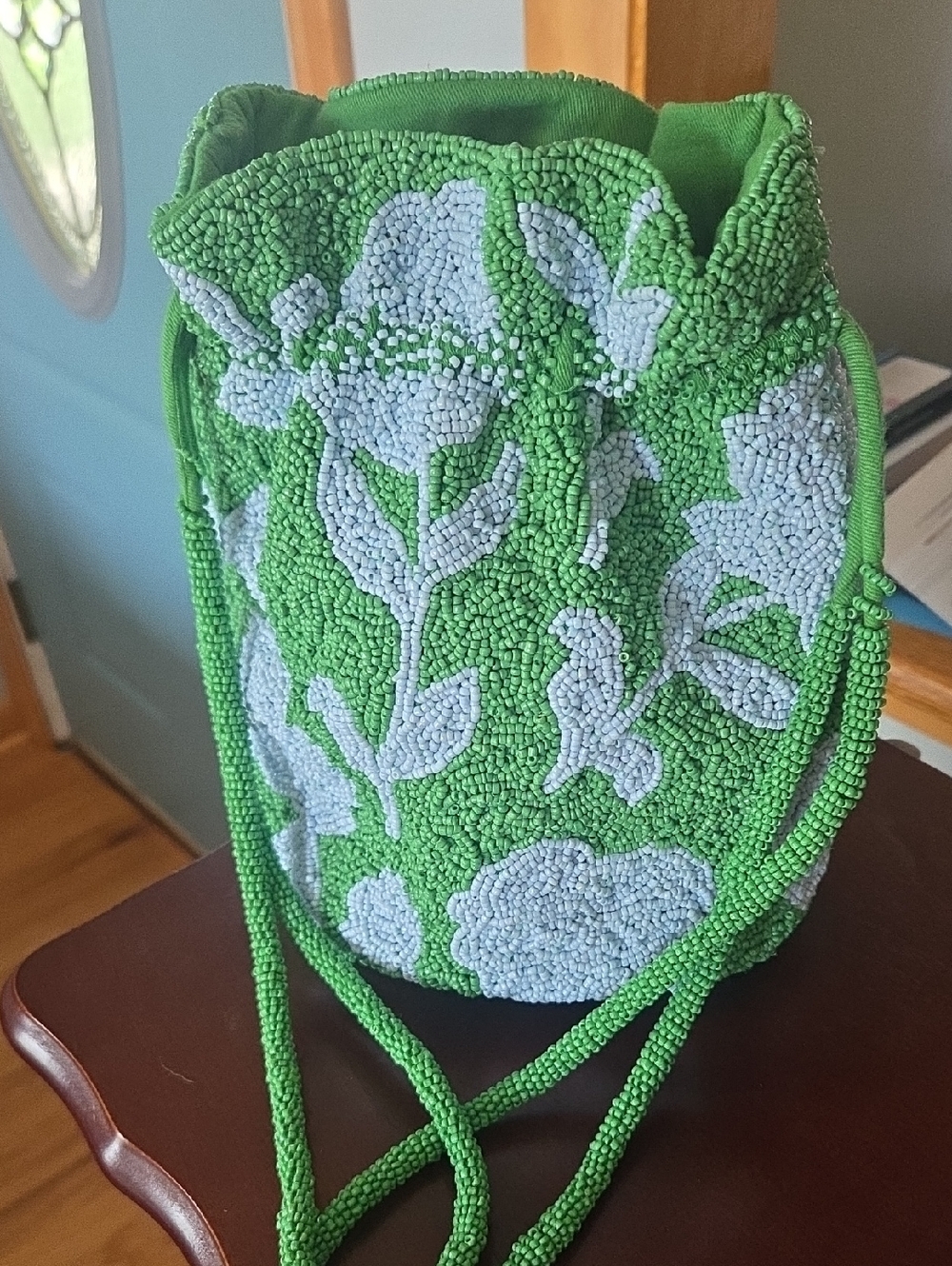 This is a Kate Spade New York x Target Beaded Classic Rose Drawstring Bucket Bag
